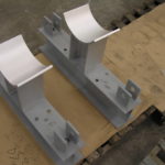 Custom pipe saddles used in trapeze style support