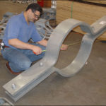 Riser Clamp For A 30 Diameter Vertical Pipe At A Power Plant